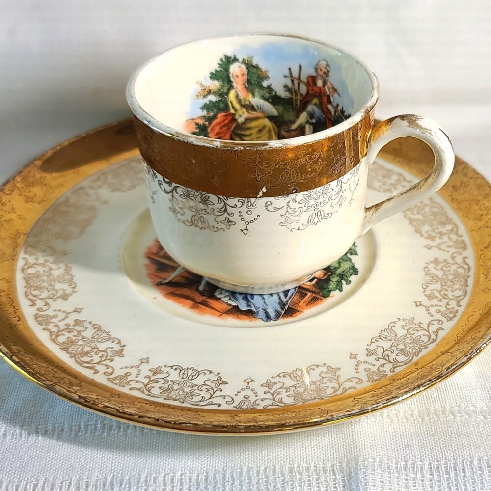 Crest O Gold by Sabin "Courting Couple" Tea Cup and Saucer, 22K Warranted Gold